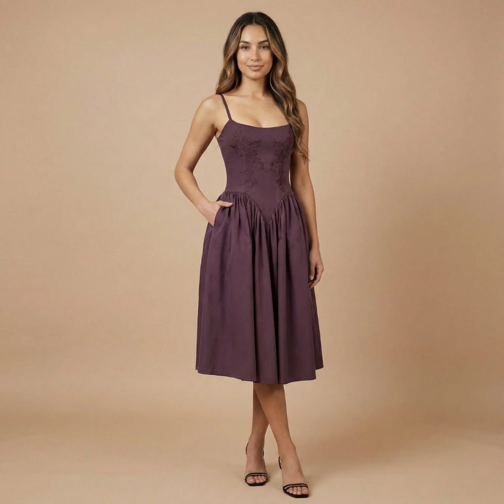 Purple midi dress with pleated skirt, side pockets and spaghetti straps