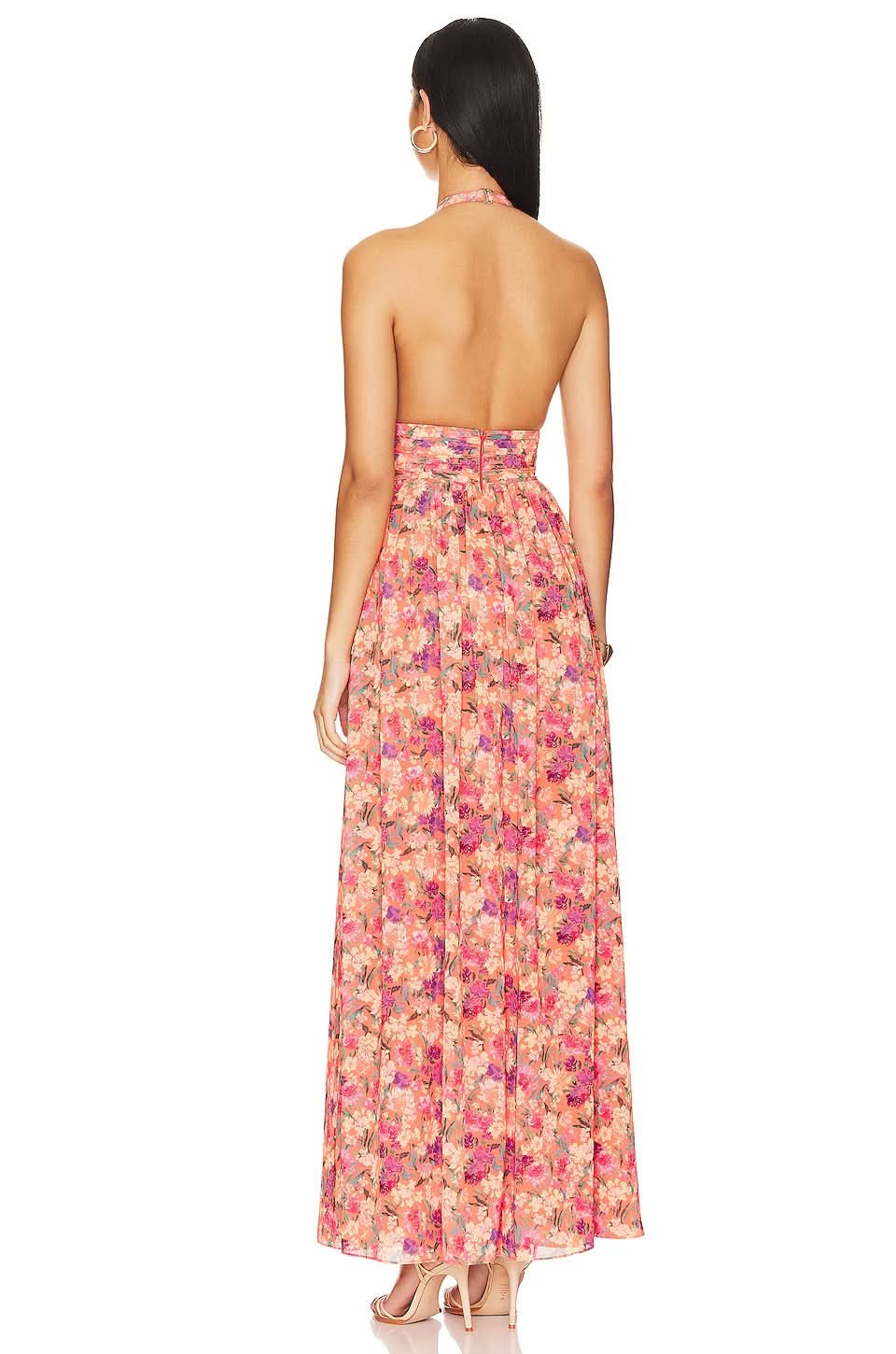 Women floral halter maxi dress back view with open back halter design and flowing skirt
