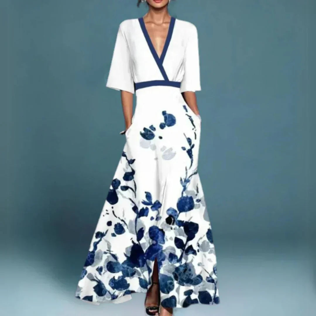 Women white maxi dress with navy blue floral print, V-neckline binding, and front slit detail