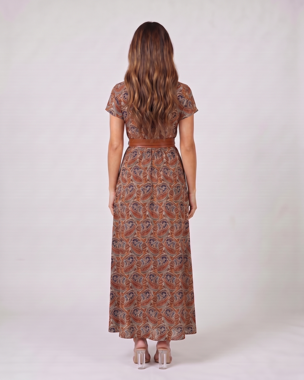 Back view of brown paisley v neck short sleeve maxi dress showing solid back