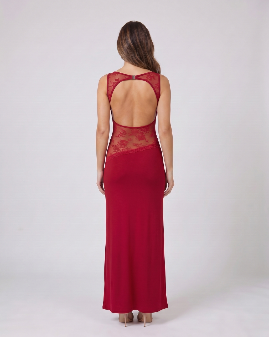 Back view of red sleeveless open back lace maxi dress showing deep open back with horizontal upper back strap and metal clasp closure