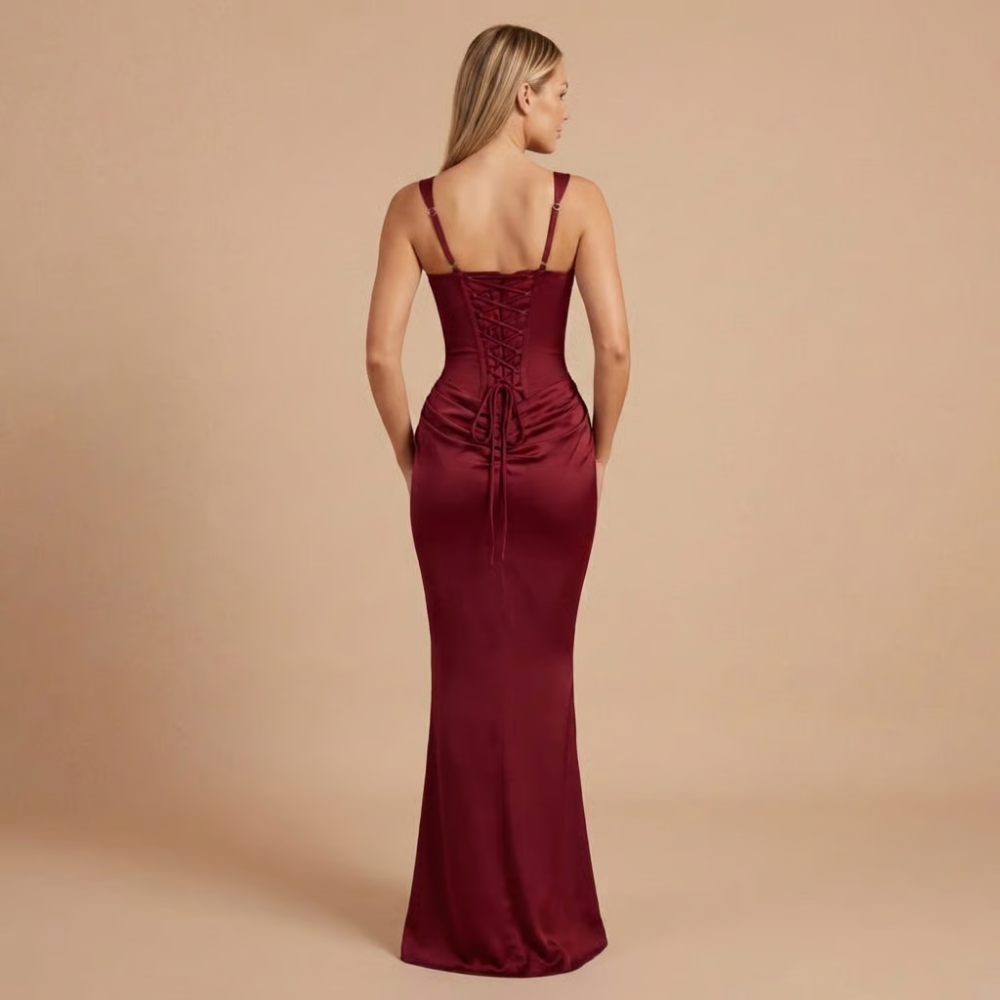 Burgundy ruched mini dress back view with lace-up corset and tie closure