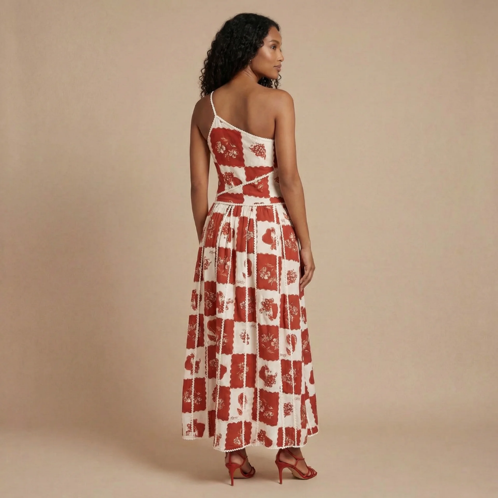 Women red and white patchwork floral one-shoulder maxi dress with pleated skirt and white trim back view