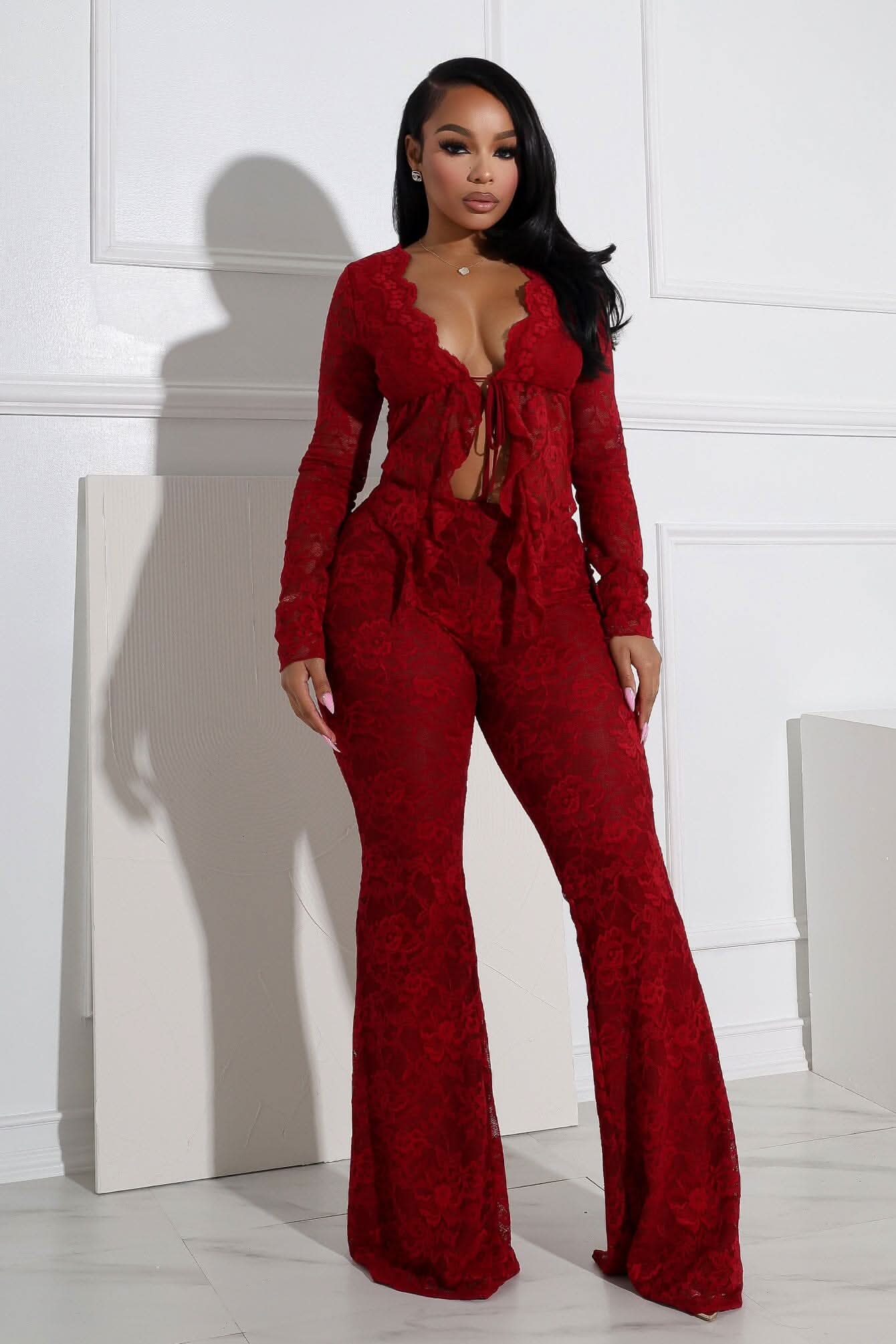 Women red floral lace tie-front top with long sleeves and high-waisted wide-leg pants