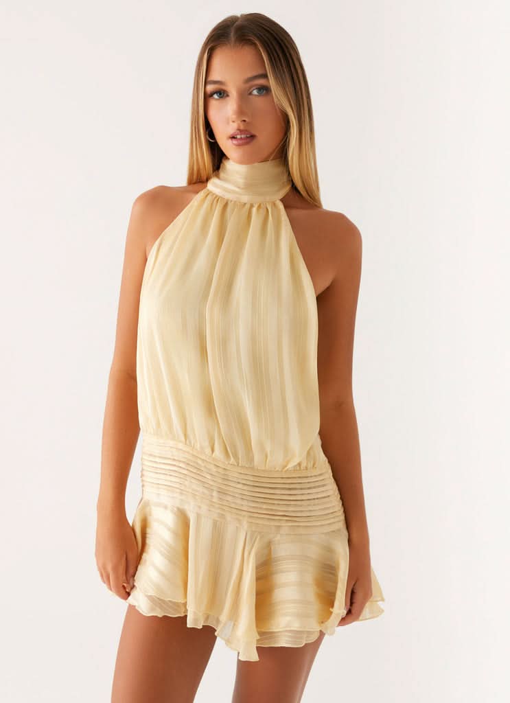 Women cream pleated halter mini dress with gathered bodice detail