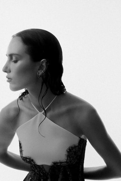 Close-up of halter neckline and lace corset bodice detail on maxi dress