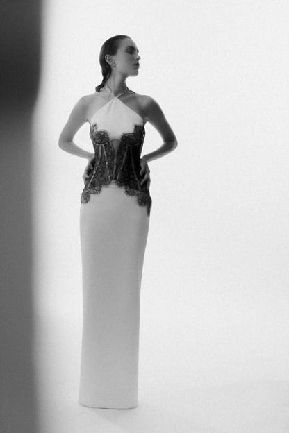 Women cream maxi dress with halter neckline and black lace corset bodice