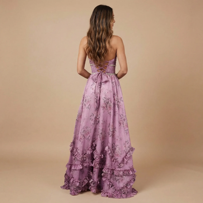 Back view of mauve purple floral halter dress with lace-up corset detail