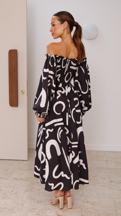 Women off-shoulder midi dress with abstract print and side slit back angle view