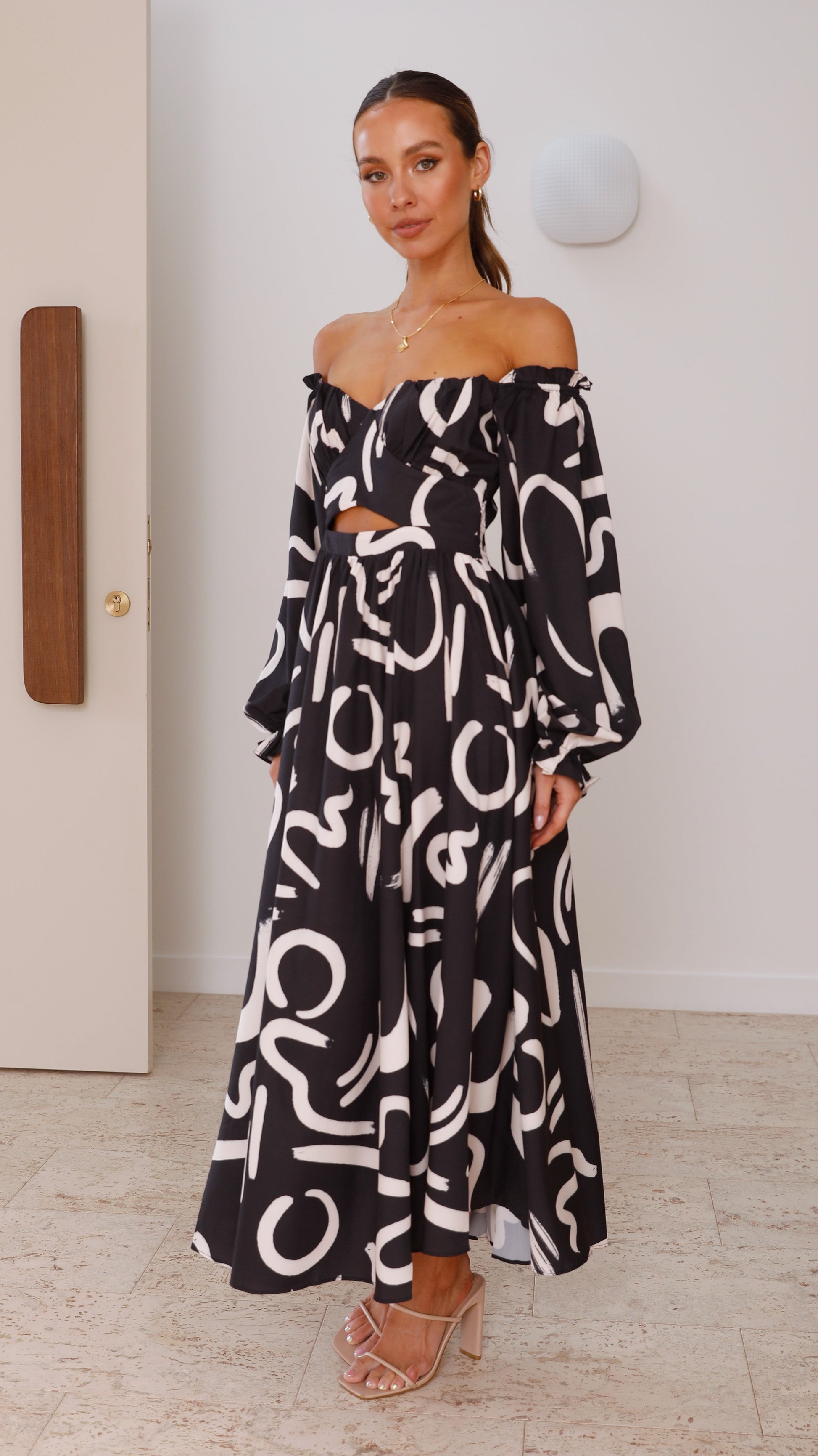 Women midi dress with off-shoulder neckline abstract pattern and waist cutout design