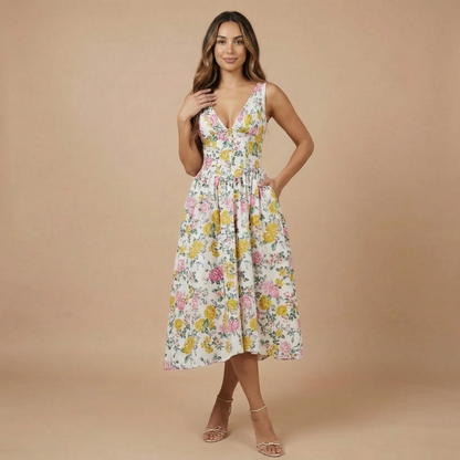 Women floral midi dress with yellow and pink blooms, V-neckline, and A-line skirt