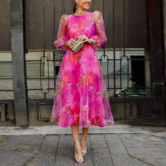 Women pink floral midi dress with puff sleeves and fitted waist