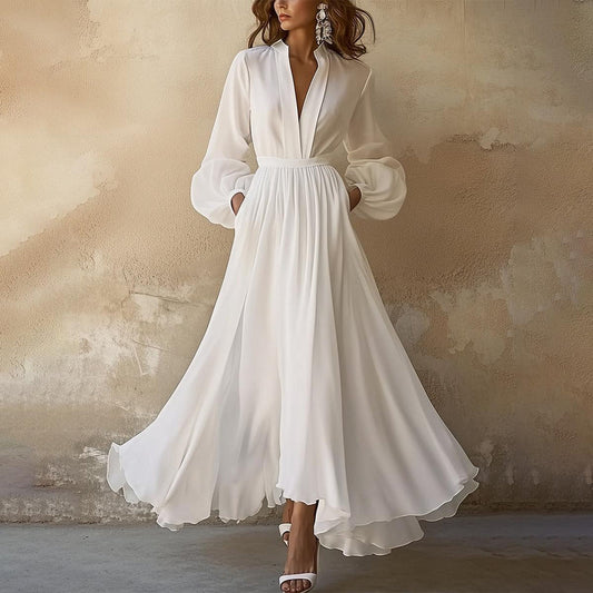 Women's white maxi dress with V-neckline and long blouson sleeves full front view