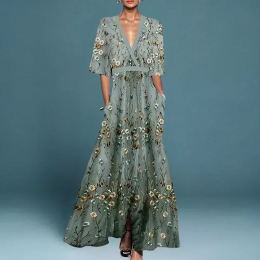 Women sage green maxi wedding guest dress with white floral embroidery, V-neckline, and elbow sleeves
