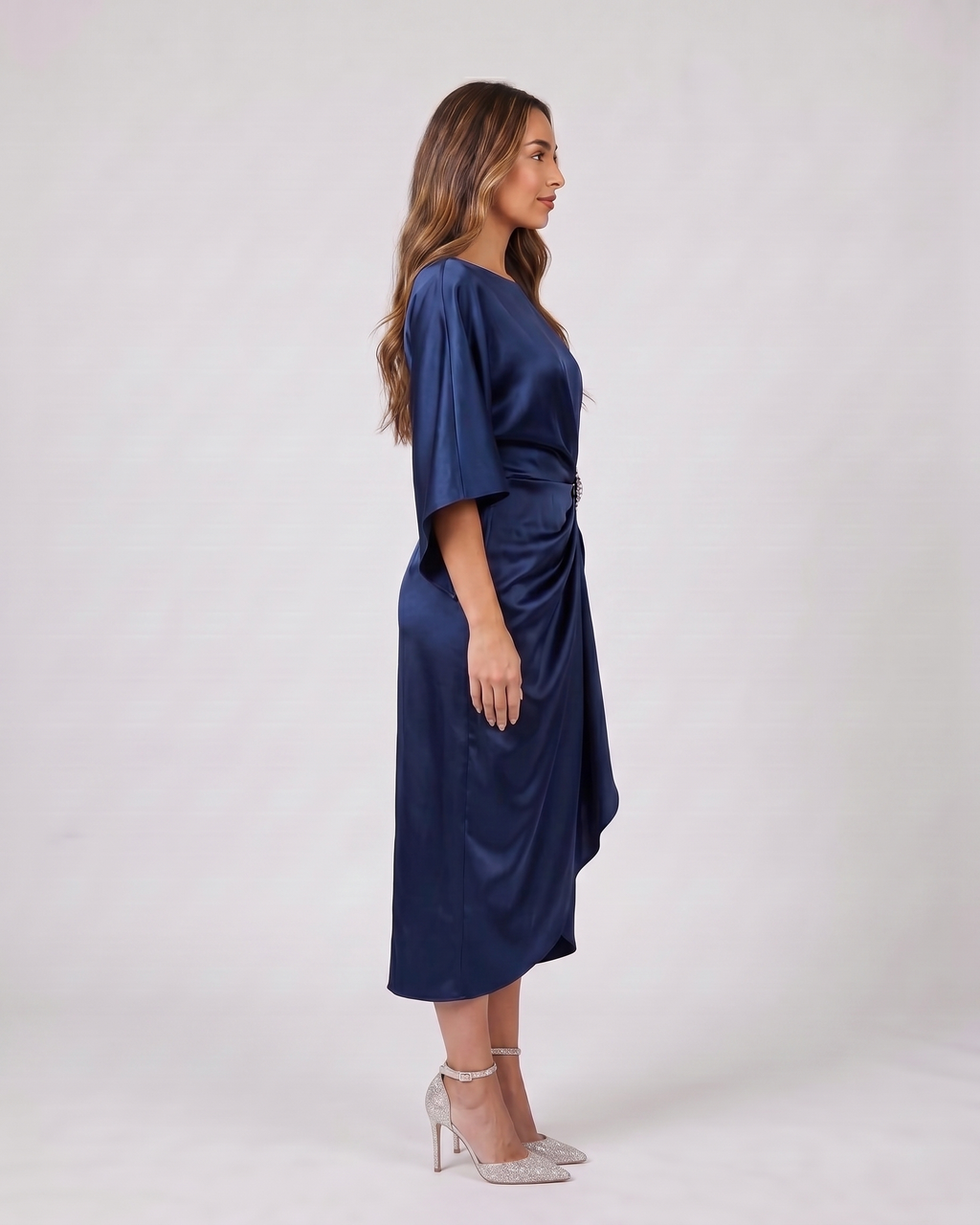 Side view of navy blue bateau neck gathered waist midi dress
