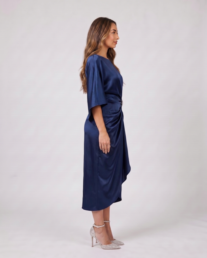 Side view of navy blue bateau neck gathered waist midi dress