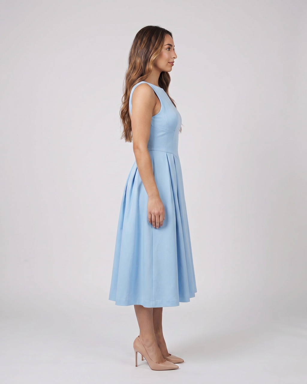 Side view of blue boat neck a-line midi dress