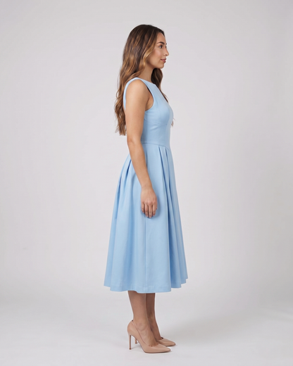 Side view of blue boat neck a-line midi dress