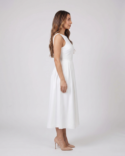 Side view of white boat neck a-line midi dress