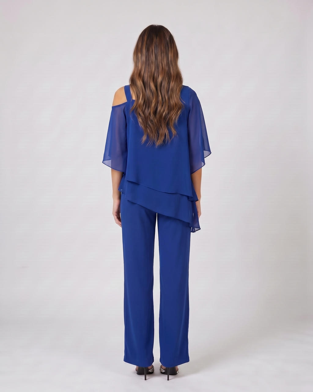 Back view of blue cold shoulder layered straight leg pant set showing solid back