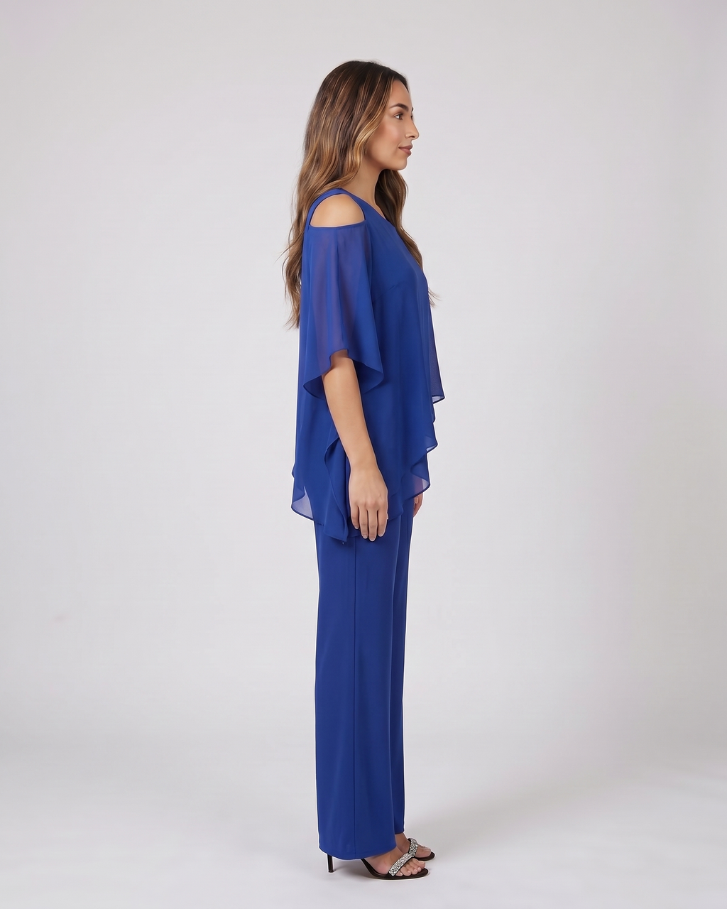Side view of blue cold shoulder layered straight leg pant set