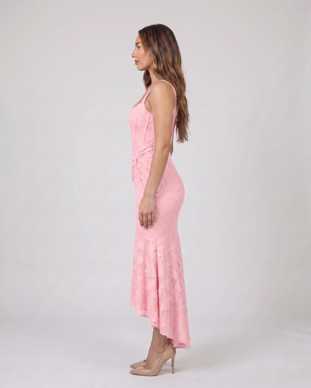 Side view of pink floral jacquard strapless high low maxi dress