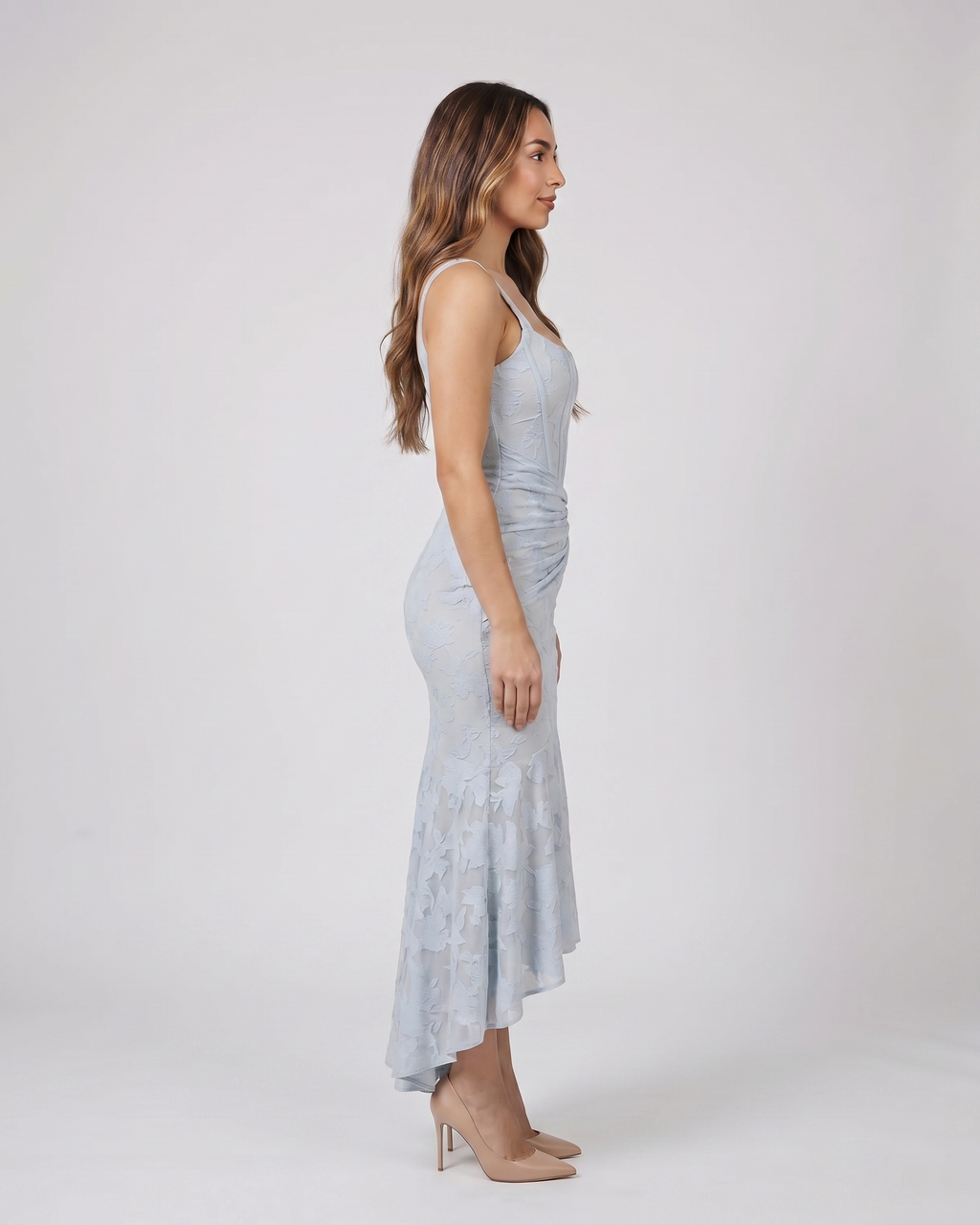 Side view of blue floral jacquard strapless high low maxi dress