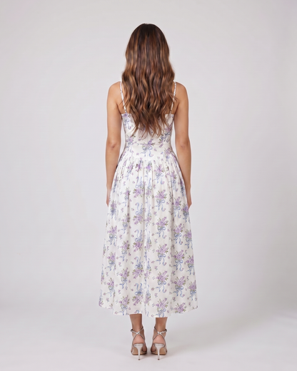 Back view of floral strapless corset midi dress showing solid back with center back zipper closure