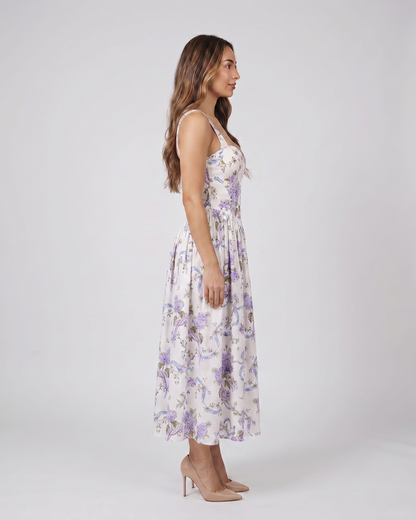 Side view of white posy floral strapless corset midi dress