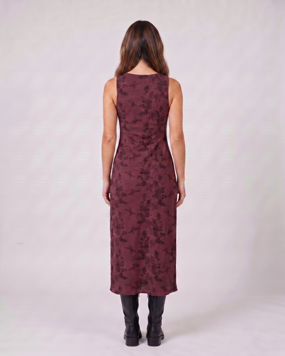 Back view of maroon floral v neck midi dress showing solid back with rounded neckline