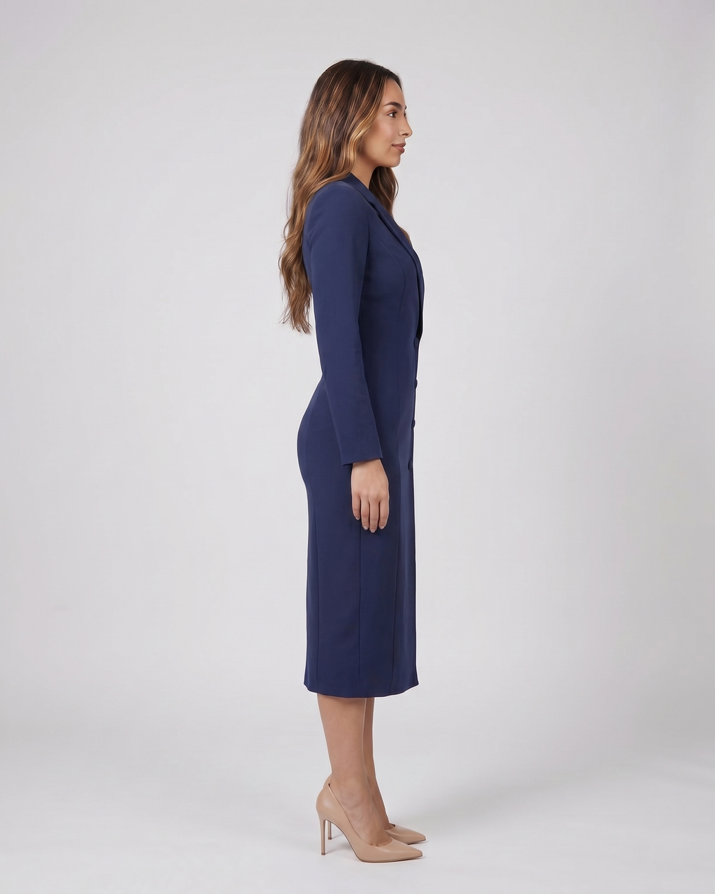 Side view of navy blue formal long sleeve v neck midi dress