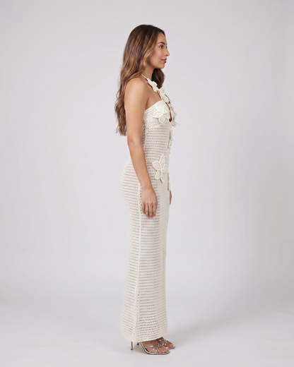 Side view of ivory halter floral applique crochet maxi dress