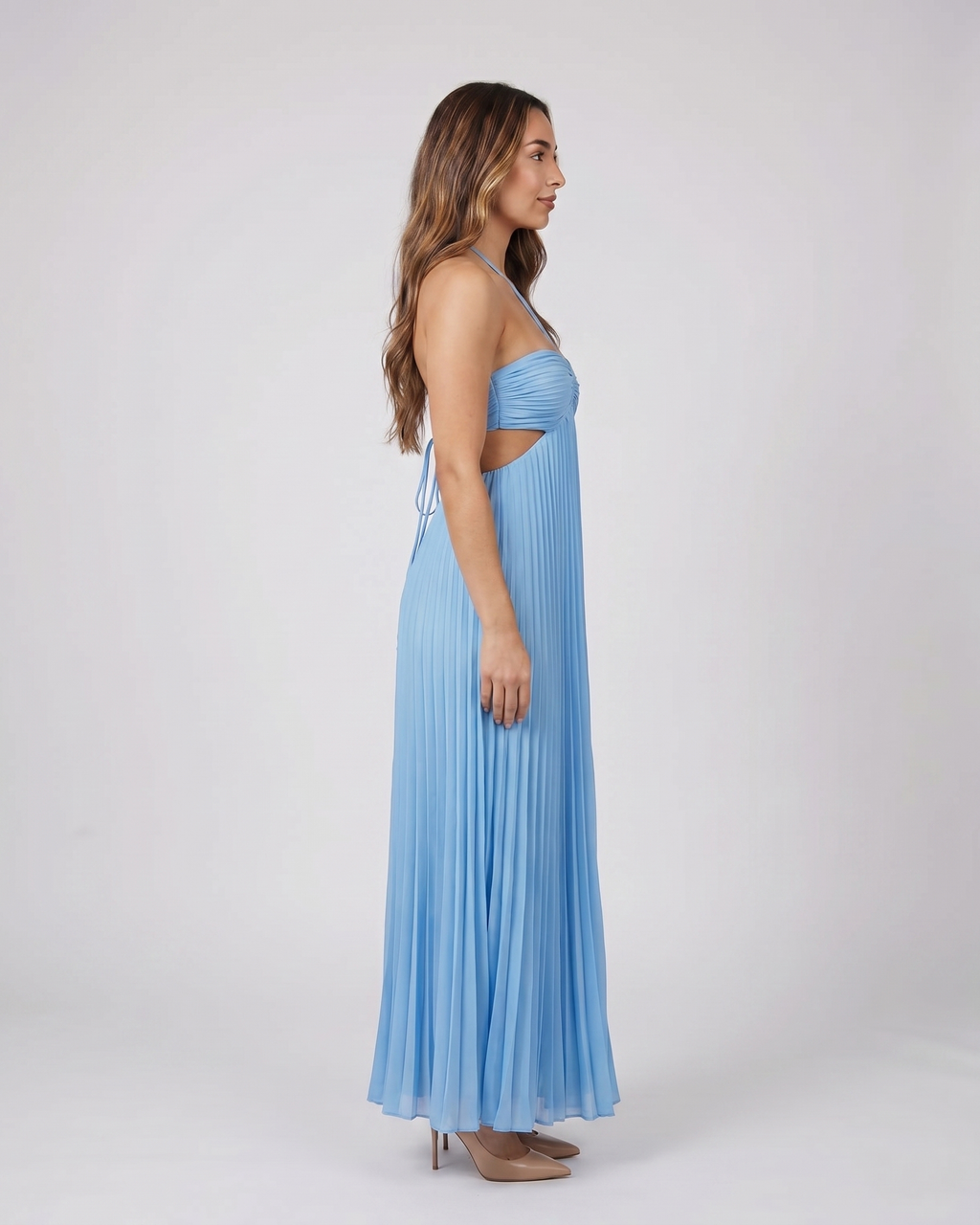 Side view of blue halter pleated with cutout maxi dress
