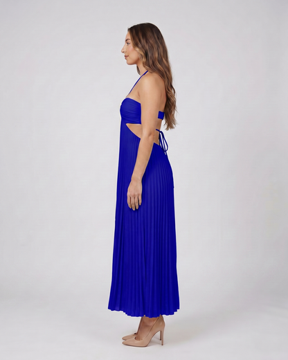 Side view of dark blue halter pleated with cutout maxi dress
