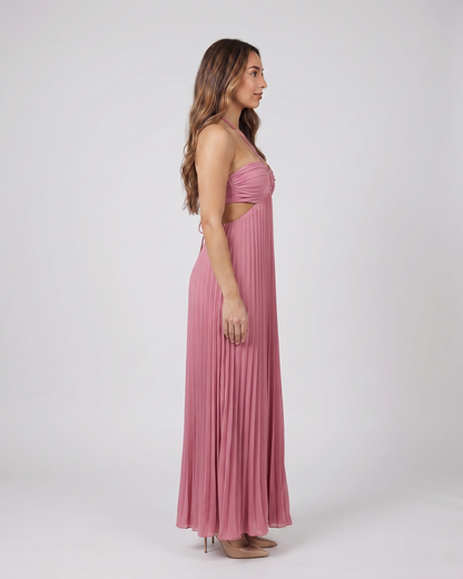 Side view of pink halter pleated with cutout maxi dress