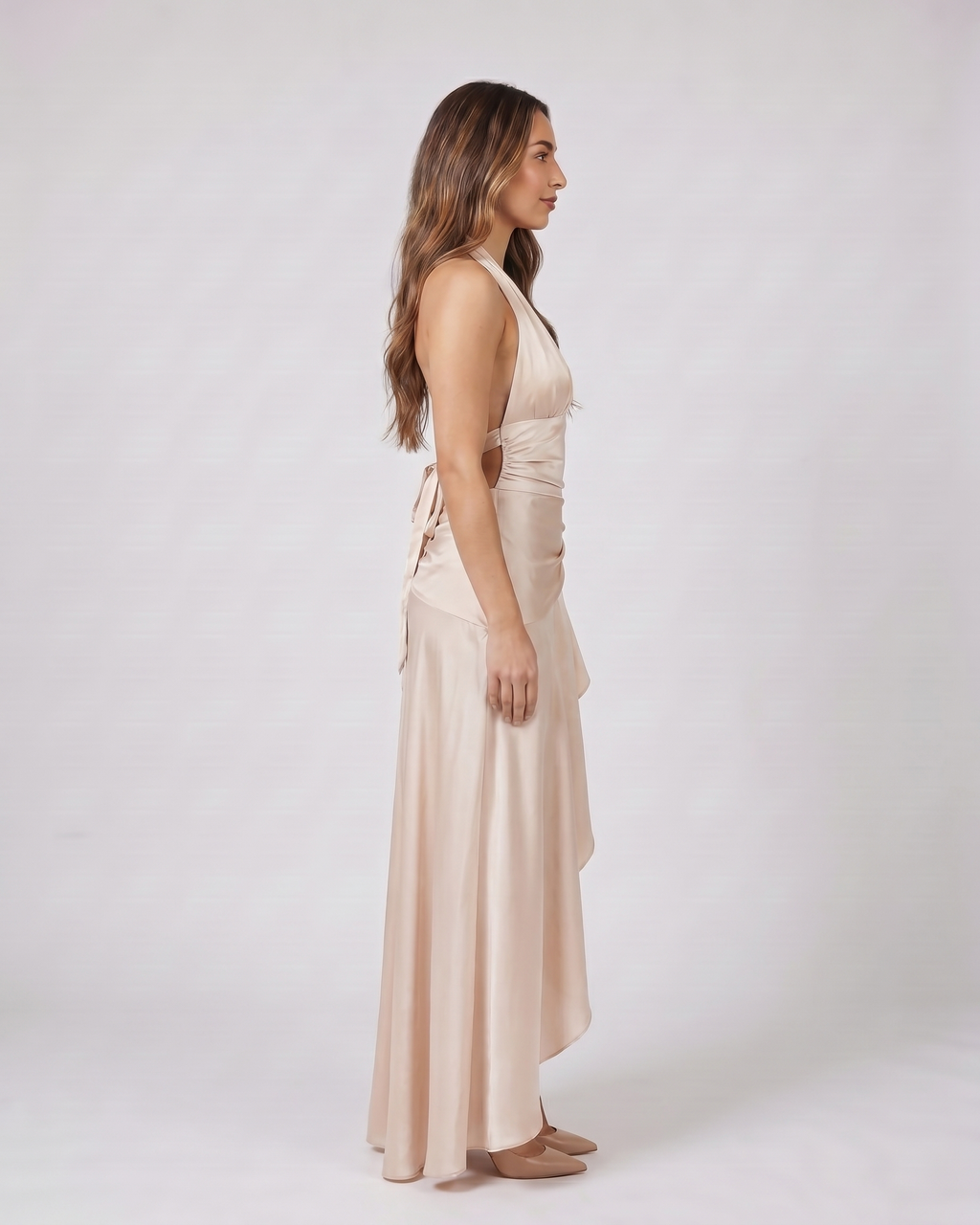 Side view of champagne halter plunge neck ruffle maxi dress