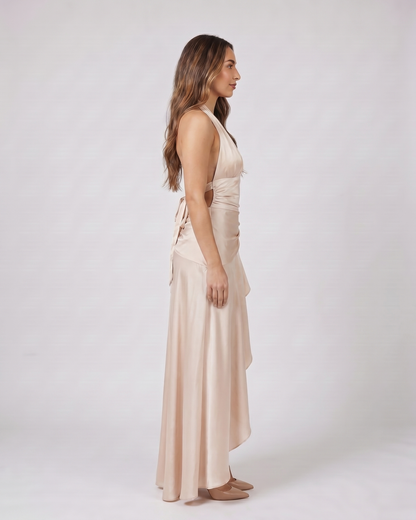 Side view of champagne halter plunge neck ruffle maxi dress