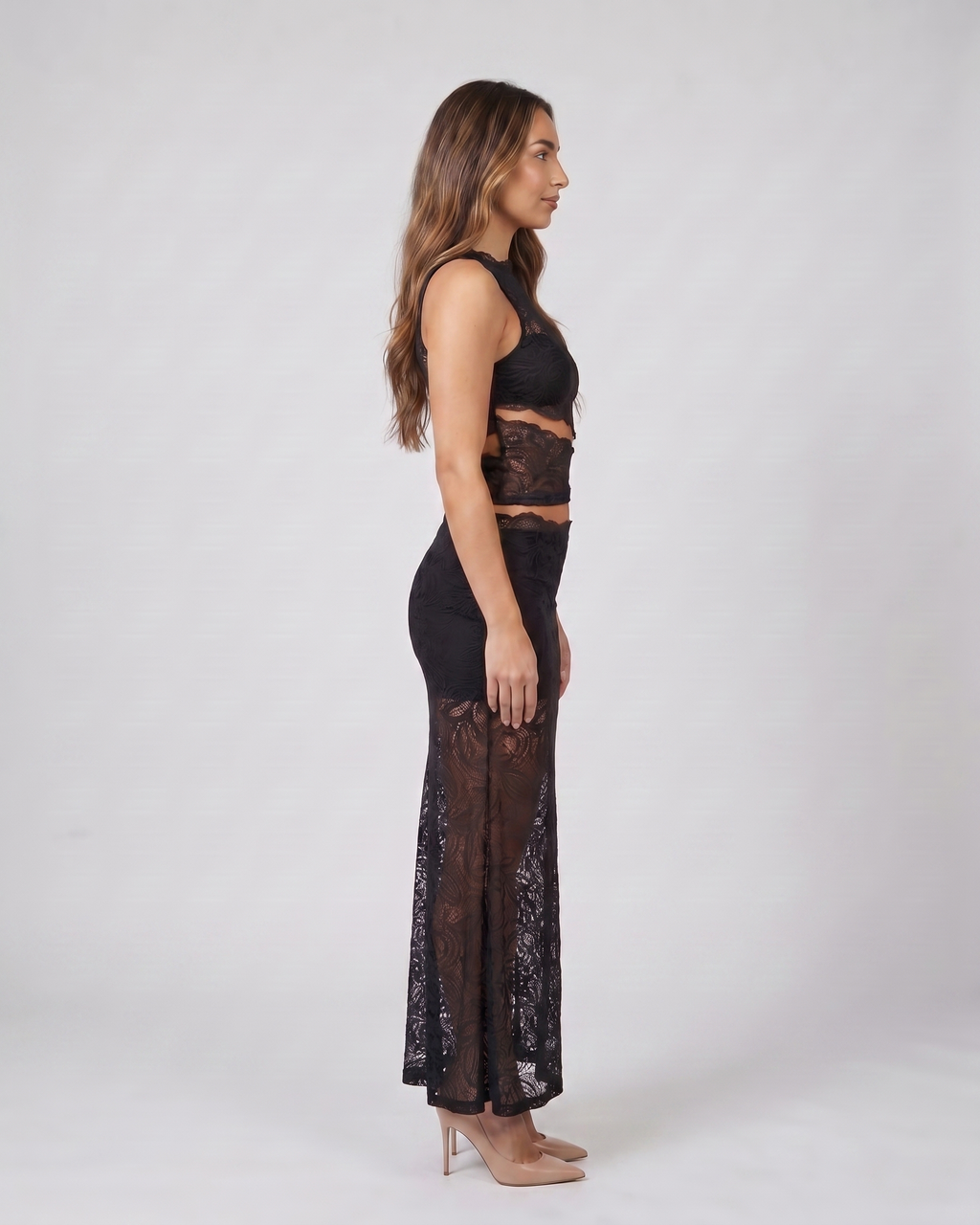Side view of black high neck lace cutout maxi set