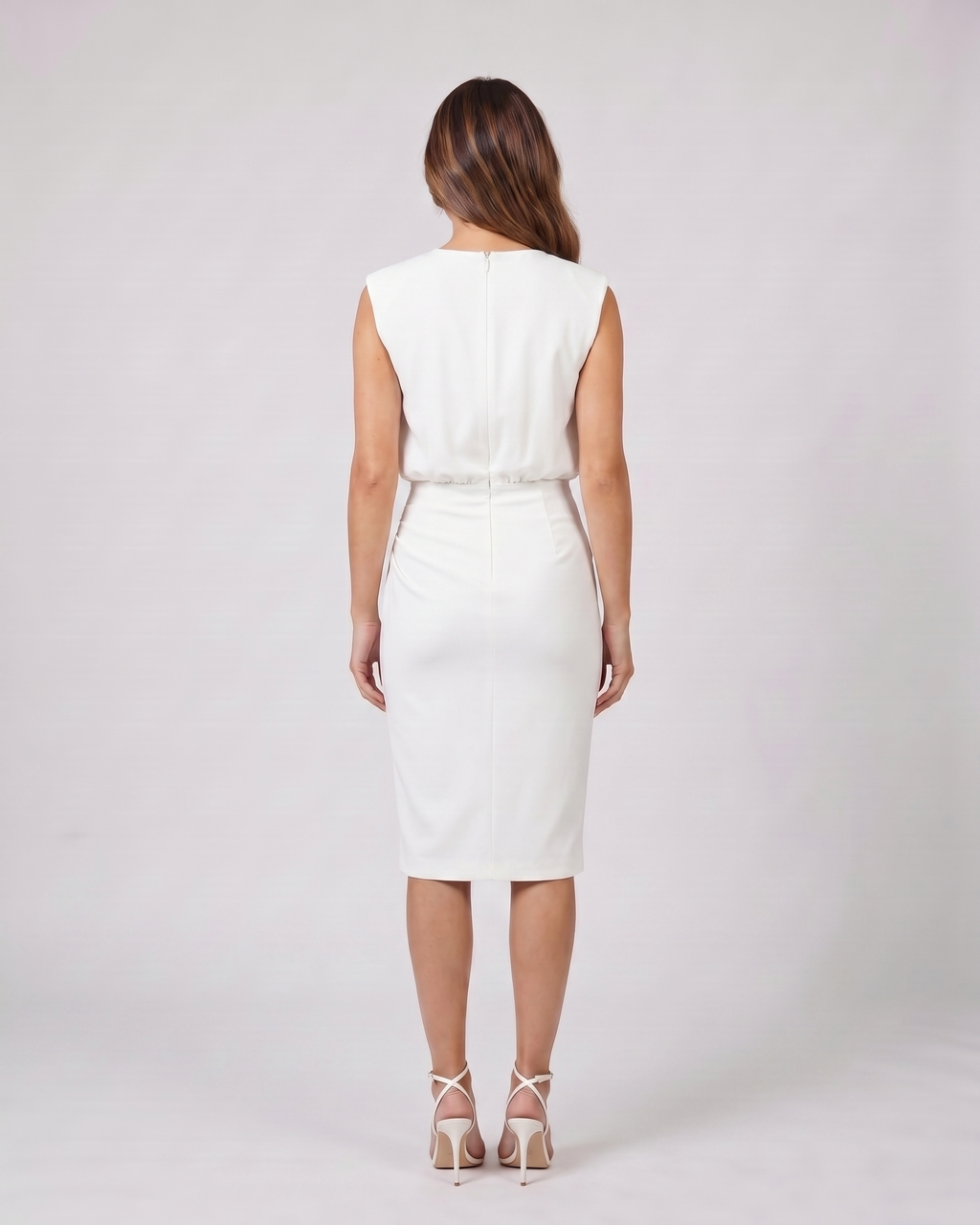 Back view of white keyhole neck ruched side midi dress showing solid back