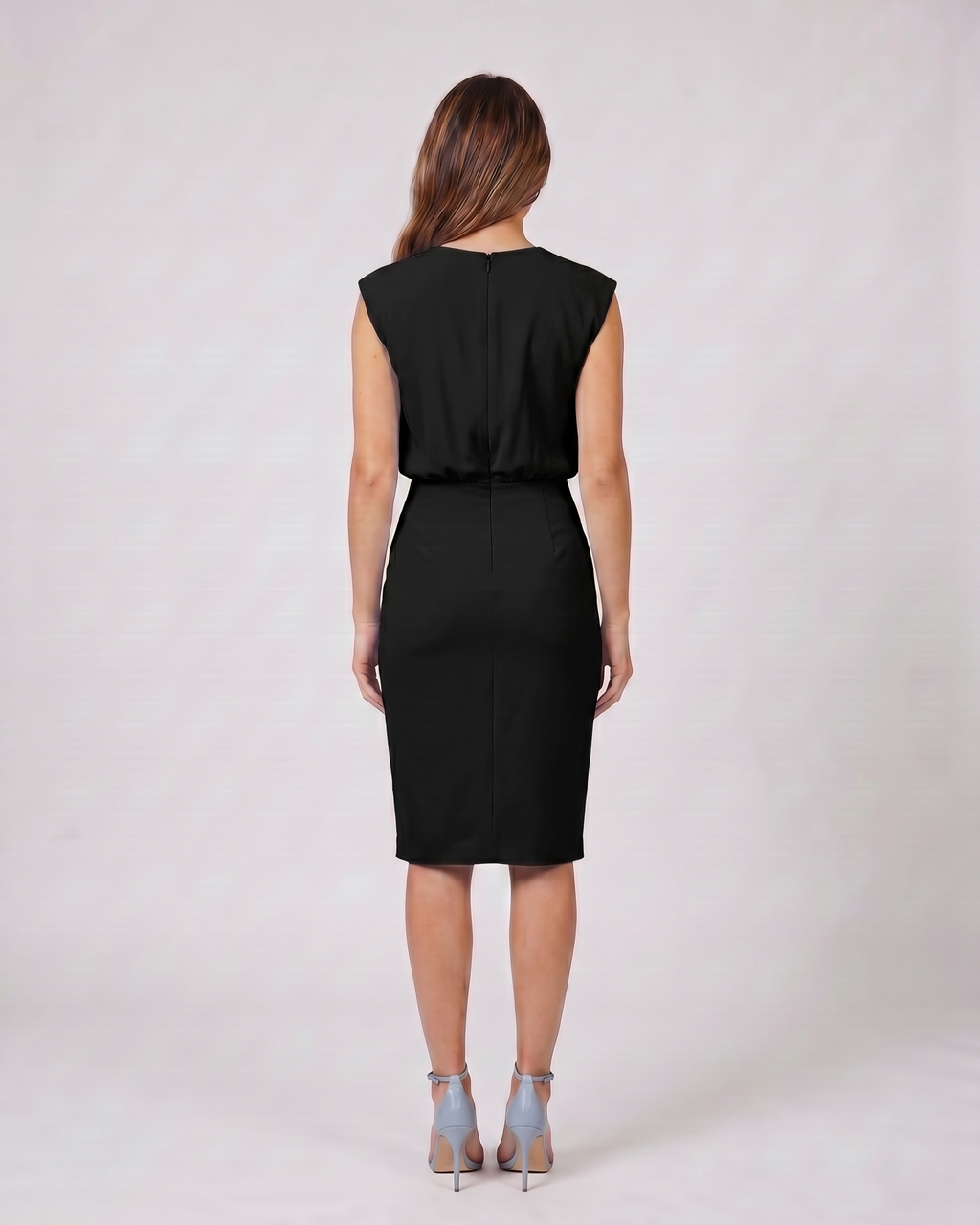 Back view of black keyhole neck ruched side midi dress showing solid back