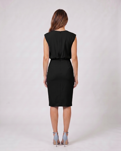 Back view of black keyhole neck ruched side midi dress showing solid back