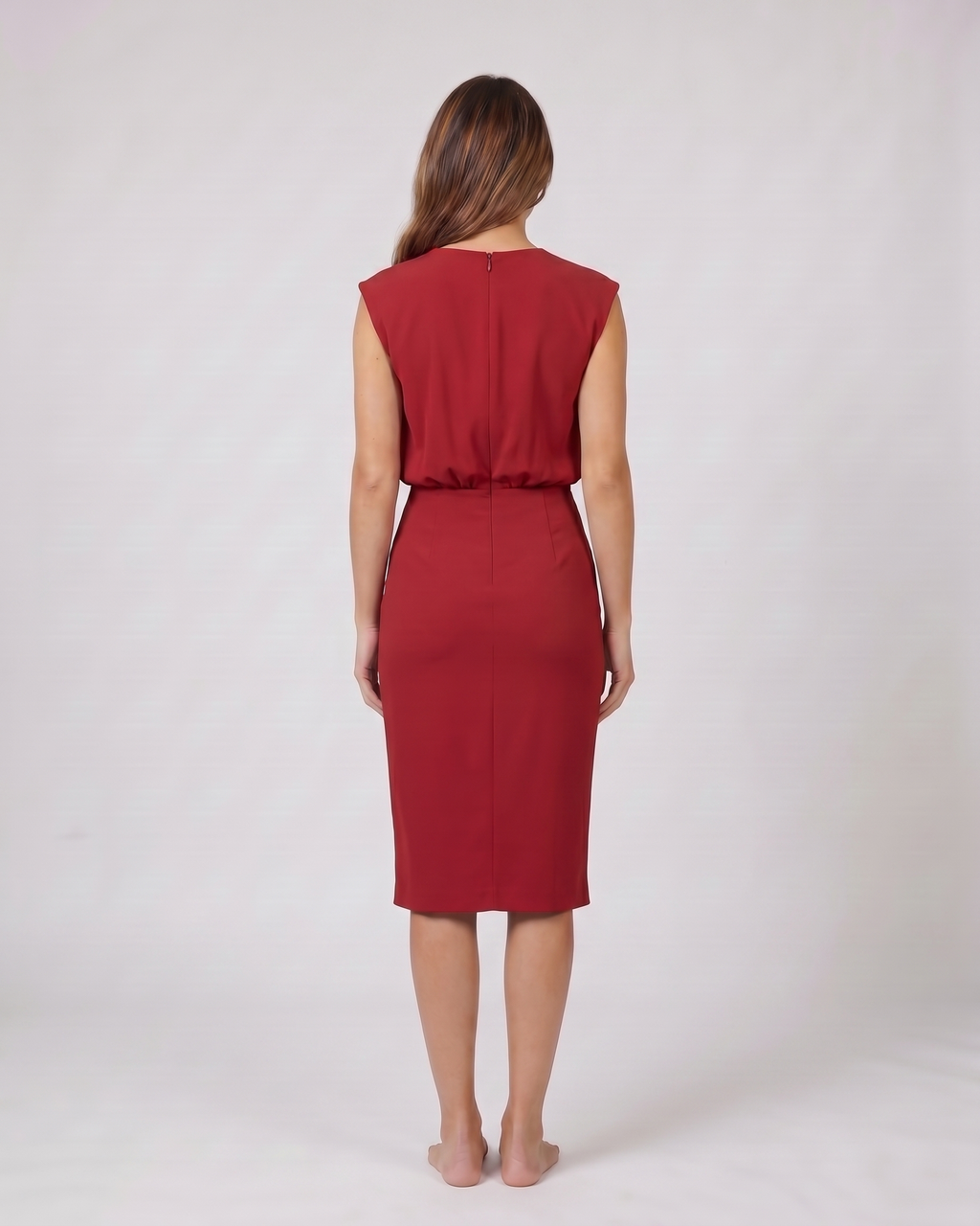 Back view of red keyhole neck ruched side midi dress showing solid back