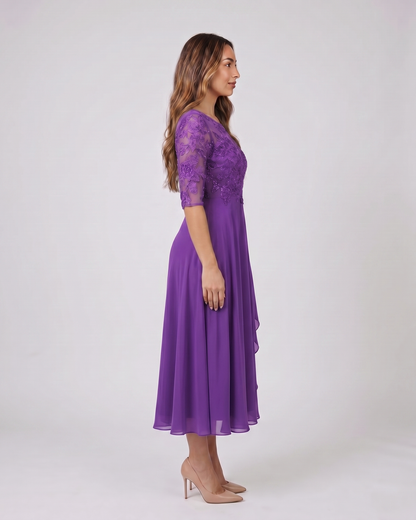 Side view of purple lace 3/4 sleeve round neck midi dress