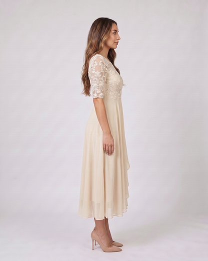 Side view of cream lace 3/4 sleeve round neck midi dress