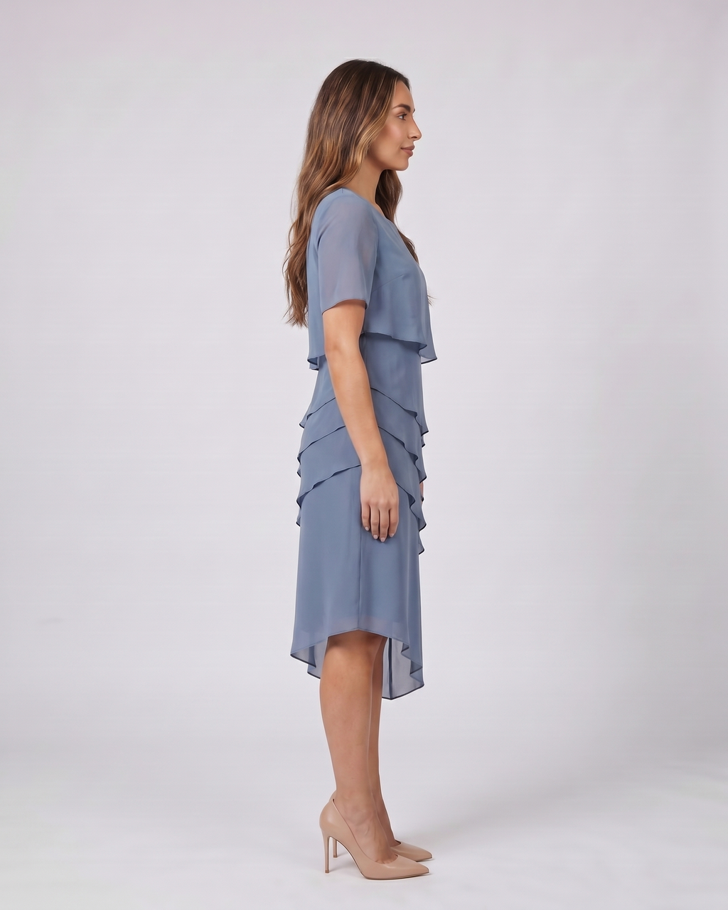 Side view of blue layered ruffled flutter sleeve midi dress
