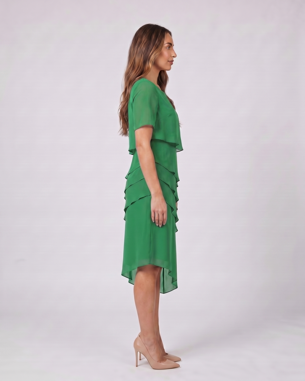 Side view of green layered ruffled flutter sleeve midi dress