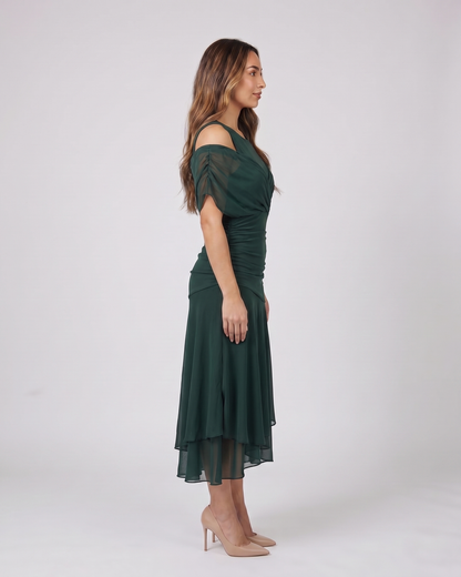 Side view of green off shoulder draped midi dress