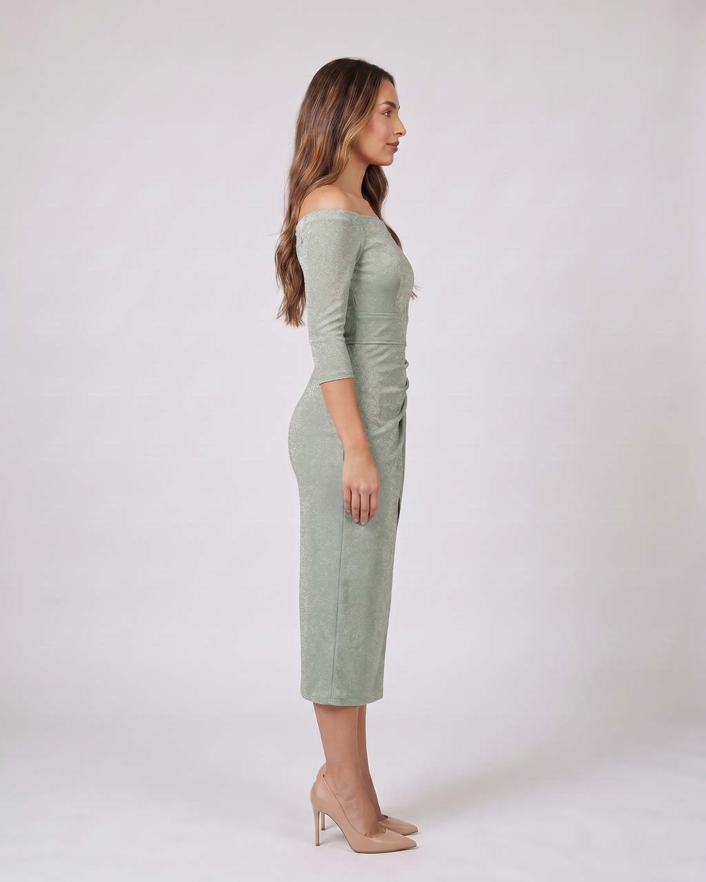 Side view of green off shoulder wrap with slit midi dress