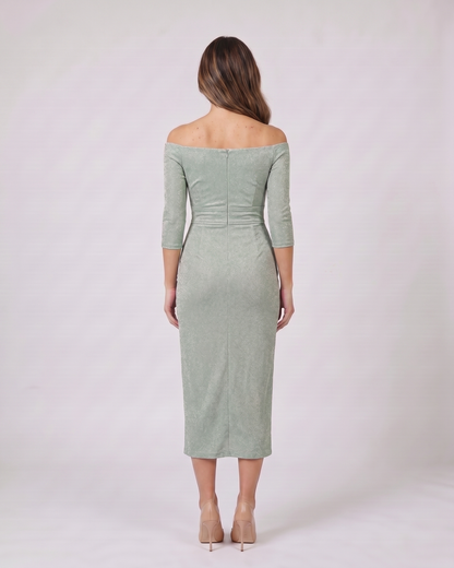 Back view of green off shoulder wrap with slit midi dress showing solid back