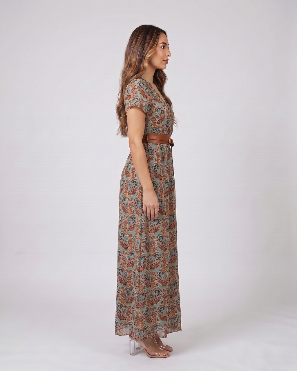 Side view of brown paisley v neck short sleeve maxi dress